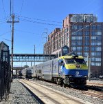 LIRR Train # 6012, being led by the class leader of the DE30ACs, bypasses Mineola Station on its trip between Jamaica and Montauk